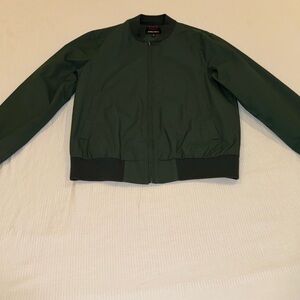 Green Bomber Jacket with Gray Pants